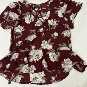 Shyanne peplum floral top size XS